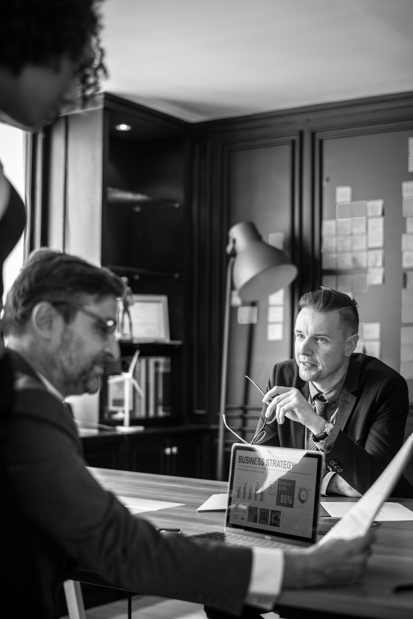 Business professionals discussing AI strategy